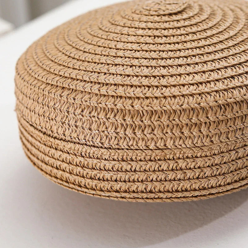 Round straw bag with zip closure and rope shoulder strap