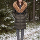 Long Belted Puffer Jacket with Large Faux Fur Hood