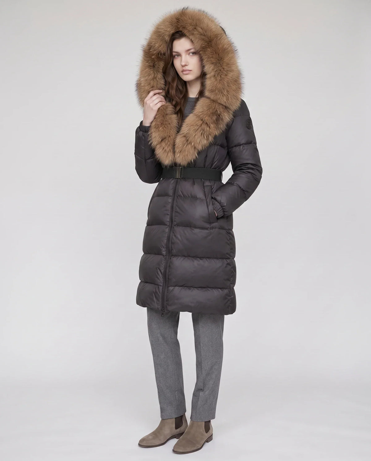 Long Belted Puffer Jacket with Large Faux Fur Hood