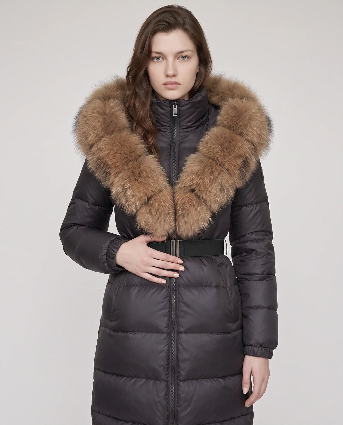Long Belted Puffer Jacket with Large Faux Fur Hood