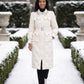 Long Belted Puffer Jacket with Jewelled Collar