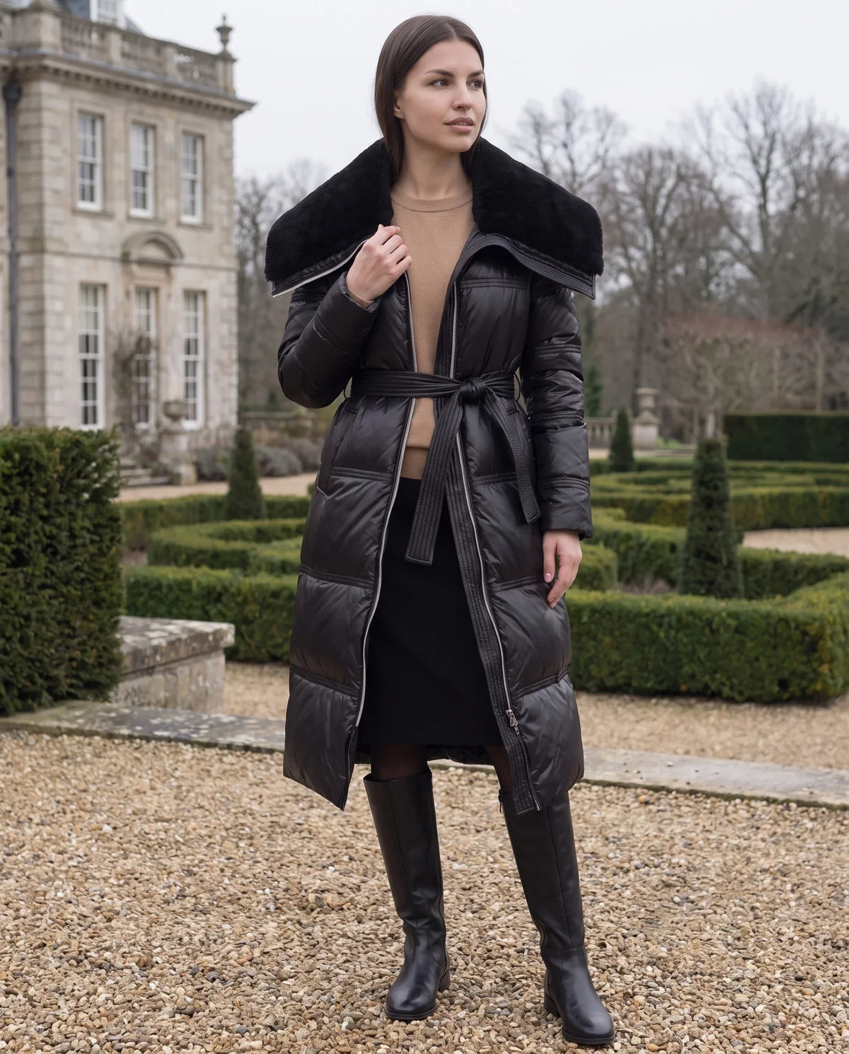 Long Belted Puffer Jacket with Faux Fur Collar