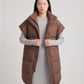 Long Oversized Sleeveless Puffer Gilet with Pleated Placket