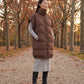 Long Oversized Sleeveless Puffer Gilet with Pleated Placket