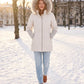 Mid-Length Quilted Parka with Knitted Sleeves