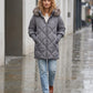 Mid-Length Quilted Parka with Knitted Sleeves